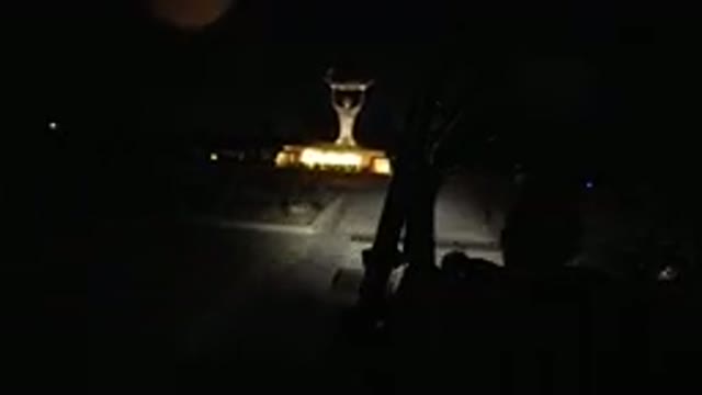 LOS CABOS MEXICO-2019: Wrangler Driving At Night Crossing A Huge Lit Statue