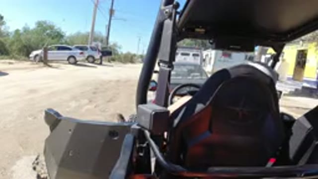 LOS CABOS MEXICO-2019: Man In Parked Wrangler In Town With Parked Cars