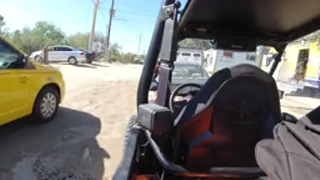 LOS CABOS MEXICO-2019: Yellow Large Wrangler With Tinted Windows Driving Slowly