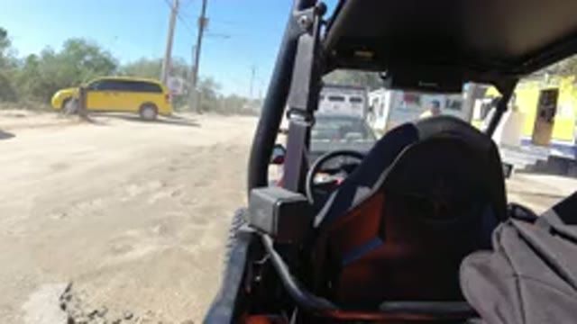 LOS CABOS MEXICO-2019: Wrangler Passes Near A Parked Vehicle On A Warm Day