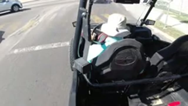 LOS CABOS MEXICO-2019: Man in White Hat and Blue Shirt Merging Into Traffic Open