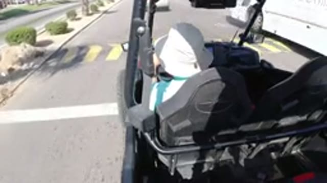 LOS CABOS MEXICO-2019: Vehicle Moves Down Divided City Street Over Speed Bump