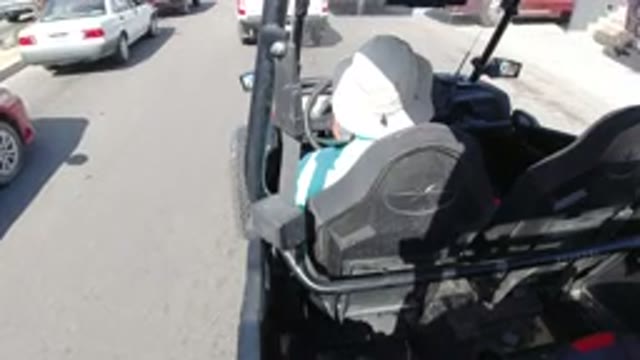 LOS CABOS MEXICO-2019: Man With White Hat Drives Funny Wrangler In The Street