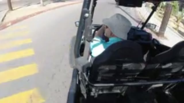 LOS CABOS MEXICO-2019: A Woman Driving a Mini Wrangler on a Sunny Road