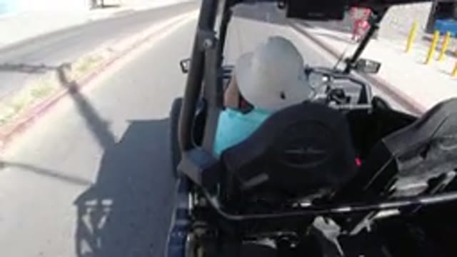 LOS CABOS MEXICO-2019: Man Driving A High-Class Golf Wrangler Down The Street
