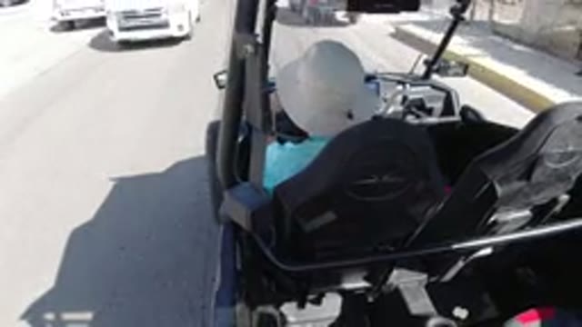 LOS CABOS MEXICO-2019: Driving Wrangler Fully Along The Busy Road