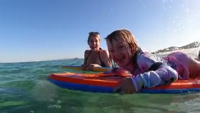 LOS CABOS MEXICO-2019: Mom And Daughter Diving In The Water
