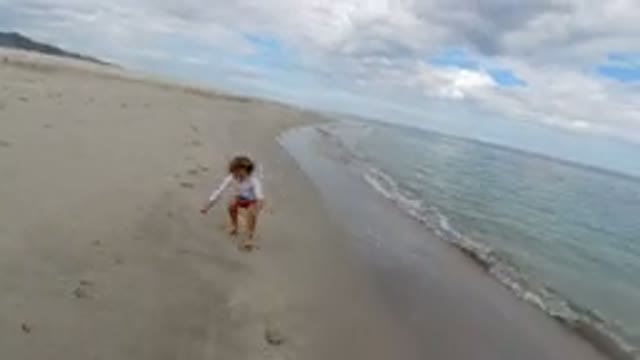 LOS CABOS MEXICO-2019: A Girl Is Running Over The Beach Side