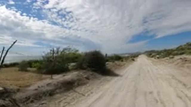LOS CABOS MEXICO-2019: Jeep Travel Near The Beach On The Rough Road Side Small