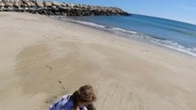 LOS CABOS MEXICO-2019: Little Girl Packs Up Belongings Before Enjoying Herself
