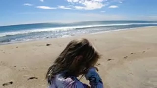 LOS CABOS MEXICO-2019: Girl Walks Along Ocean