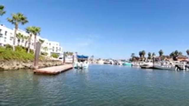 LOS CABOS MEXICO-2019: View From A Boat As It Sails Past A Dock