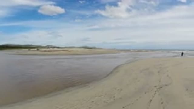 LOS CABOS MEXICO-2019: Beach Low Tide Two People Promenade Sunny Day Vegetation