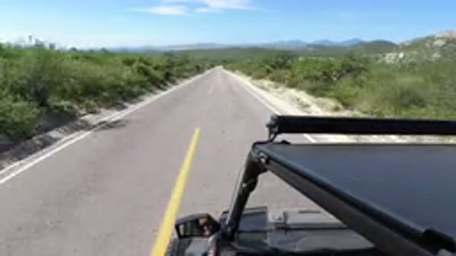 LOS CABOS MEXICO-2019: View From A Vehicle Traveling Along A Paved Road