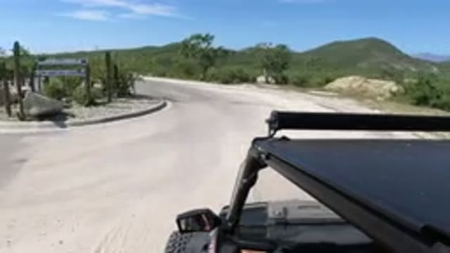 LOS CABOS MEXICO-2019: Camera Mounted To A Jeep Driving Down The Road That Winds