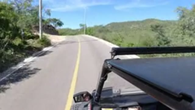 LOS CABOS MEXICO-2019: Camera Mounted To The Top Of A Jeep That Is Driving Along