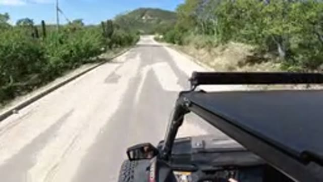 LOS CABOS MEXICO-2019: Camera On Top Of A Jeep Moving Down The Road With No