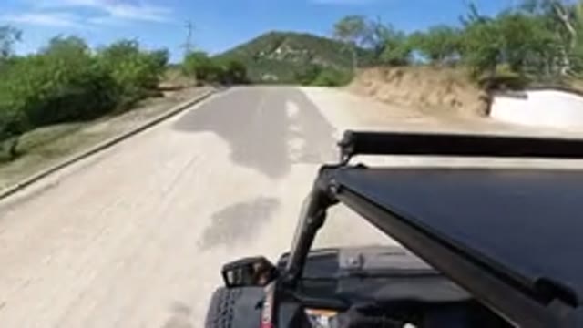 LOS CABOS MEXICO-2019: Wrangler Driving Down Highway In Mountains By Itself