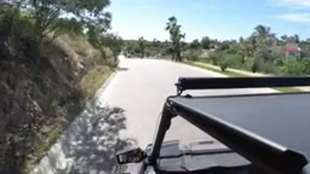 LOS CABOS MEXICO-2019: A Vehicle Travels a Long Path on a Sunny Day