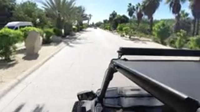 LOS CABOS MEXICO-2019: Jeep Driving Down A Road In The Desert On A Sunny Day