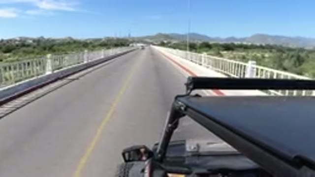 LOS CABOS MEXICO-2019: A Wrangler Moving Forward On The Bridge And Mountains