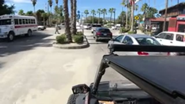 LOS CABOS MEXICO-2019: A Wrangler Entering A Line Of Wranglers Headed For An