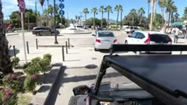 LOS CABOS MEXICO-2019: Woman Drives Jeep Wrangler on Coastal Road