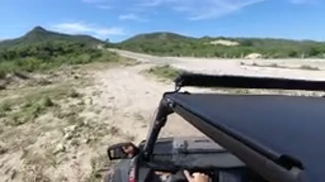 LOS CABOS MEXICO-2019: The Guy Driving The Small Black Truck Pulled Over On The Side Of The Road