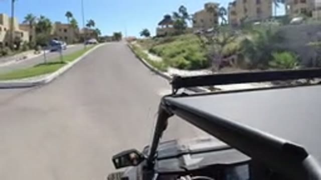 LOS CABOS MEXICO-2019: Wrangler Going Up A Curved Street In A Residential Neighborhood