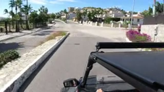 LOS CABOS MEXICO-2019: People In A Wrangler Driving In A Street With Three On