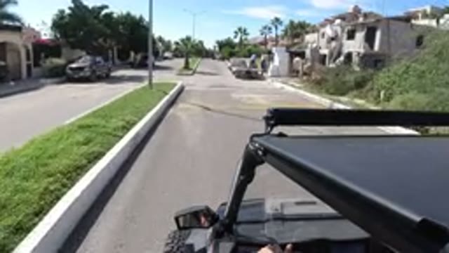 LOS CABOS MEXICO-2019: Wrangler Driving Down A Neighborhood On A Sunny Day