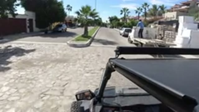 LOS CABOS MEXICO-2019: Wrangler Driving Through a Street on a Nice Cloudy Day