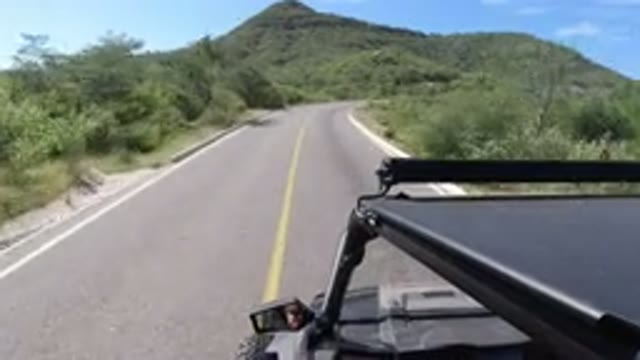 LOS CABOS MEXICO-2019: Wrangler Driving On A Narrow Road On A Sunny Day