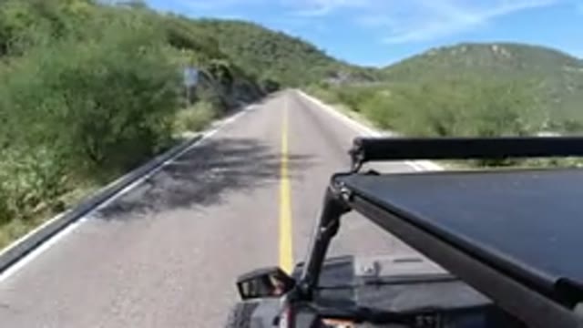 LOS CABOS MEXICO-2019: Sport Utility Vehicle Moving At High Speeds On Mountain Road