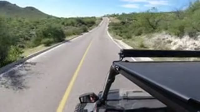 LOS CABOS MEXICO-2019: Calmly Driving Through The Highway With A Lot Of Green To