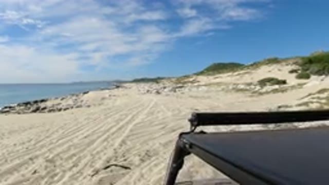 LOS CABOS MEXICO-2019: A Camera Mounted On Top Of A Jeep As The Jeep Drives Down