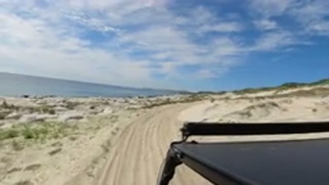 LOS CABOS MEXICO-2019: A Vehicle Is Traveling On Sand Road On Beach With Ocean View