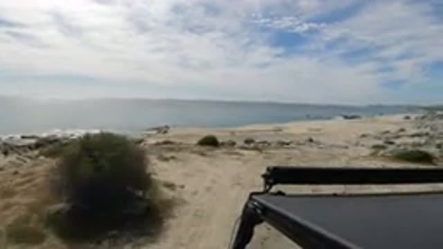 LOS CABOS MEXICO-2019: A Wrangler Is Driving Through A Rocky Road Along The