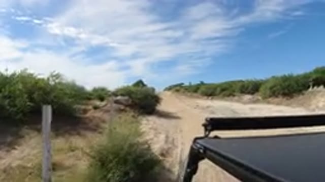 LOS CABOS MEXICO-2019: A Vehicle Driving On A Rocky Road On A Cloudy Day