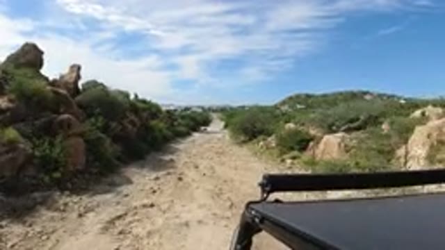 LOS CABOS MEXICO-2019: A Small Go-Kart Driving In The Mountains On A Rocky Road