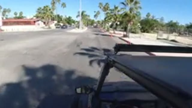 LOS CABOS MEXICO-2019: Person Driving Wrangler Through The Street With Beautiful