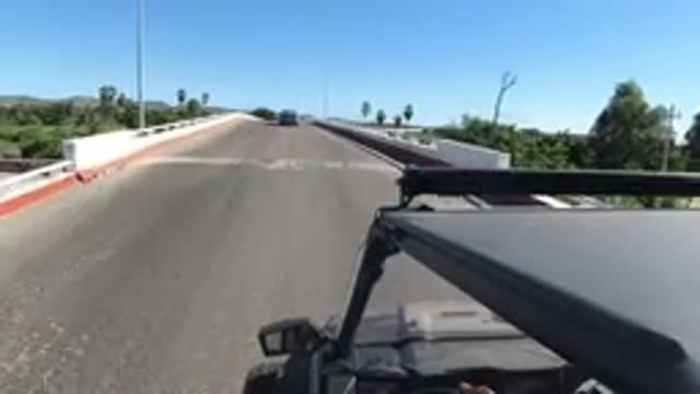 LOS CABOS MEXICO-2019: Jeep Wrangler Drives Across Bridge