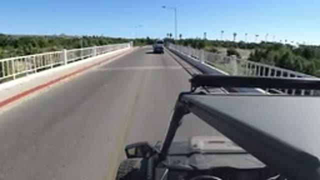 LOS CABOS MEXICO-2019: Tires Vehicle Bridge Behind Light Pole Mirror Bump Sky