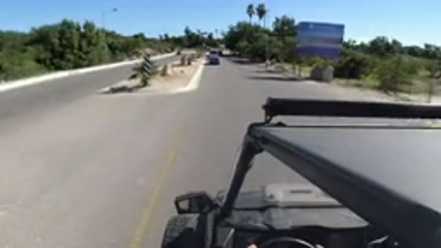 LOS CABOS MEXICO-2019: A Wrangler Going Up A Slope With Other Wranglers On The