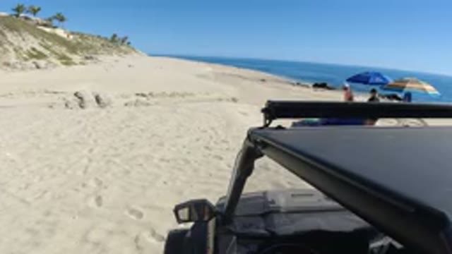 LOS CABOS MEXICO-2019: Wrangler Parked Near Beach With People