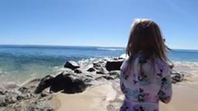LOS CABOS MEXICO-2019: Mother With Her Child And Her Dog Going For A Walk And A