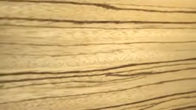 Wooden Board Is Rotating By Someone