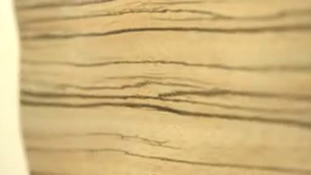 A Wooden Board Is Rotating