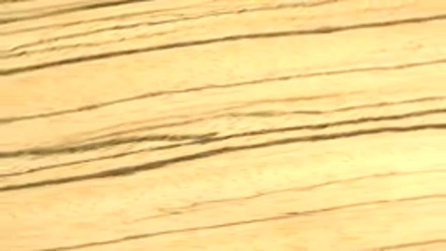 A Rotating Facsimile Of A Piece Of Wood