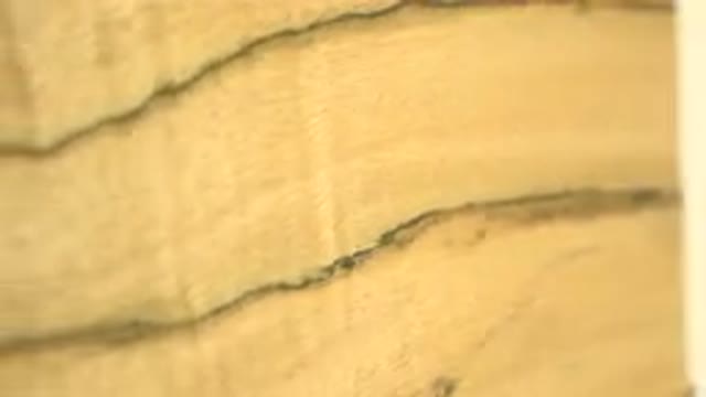 An Extremely Thin Piece Of Wood Texture Spinning Around From Front To Back